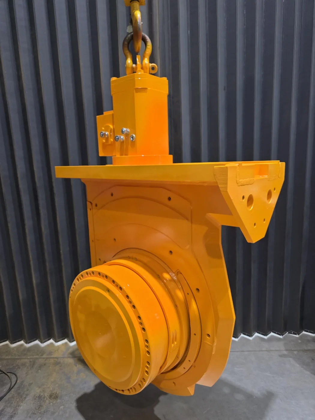 BC40 gearbox in final topcoat, lifted on the crane hook after assembly